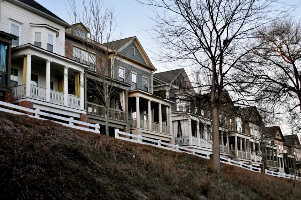 Wooden rowhouses with white fences in Atlanta, Georgia